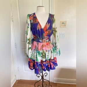 A PEACH Tropicana Dress A-line cut, floral print layered, long sleeves.